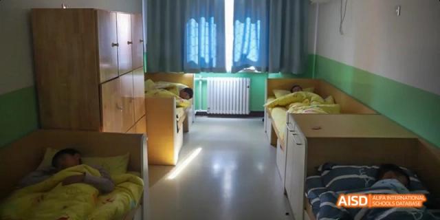 A tidy dormitory room at Beijing 21st Century School.
