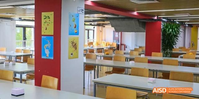 A photo showing an empty cafeteria, at Beijing Enlighten School.