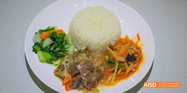 A photo showing a plate of healthy food, at Beijing Enlighten School.
