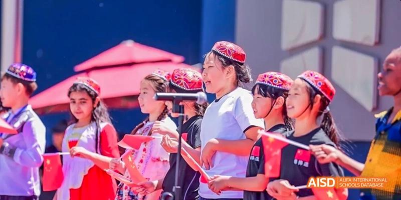 A photo showing a group of students participating in an event, at Beijing Enlighten School.