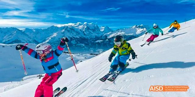 A photo showing a person skiing, at Beijing Enlighten School.