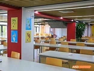 A photo showing an empty cafeteria, at Beijing Enlighten School.