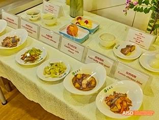 A photo showing different varieties of healthy food items in plates, at Beijing Enlighten School.