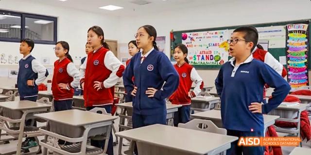 Students from Beijing Haidian Foreign Language Academy participating in a classroom discussion.