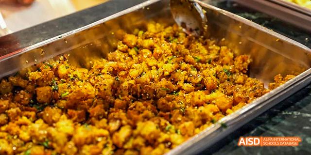A close-up of crispy, fried food from the cafeteria of Beijing Haidian Foreign Language Academy.