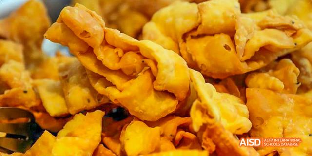 A close-up of fried pastries from the cafeteria of Beijing Haidian Foreign Language Academy.