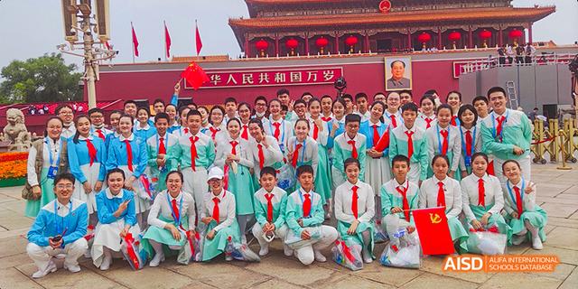 Students from Beijing National Day School International Department posing for a group photo in front of Tiananmen Square.