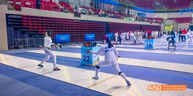 Students from Beijing National Day School International Department participating in a fencing competition.