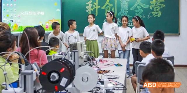 Camford Royal School students presenting science projects in front of class