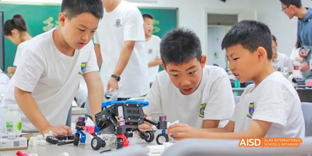 Camford Royal School students building a robot during a science class