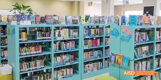 A large bookcase full of books at Dalian American International School.