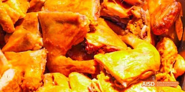 Fuzhou Concord College of Sino-Canada students eating a close-up of a meat dish