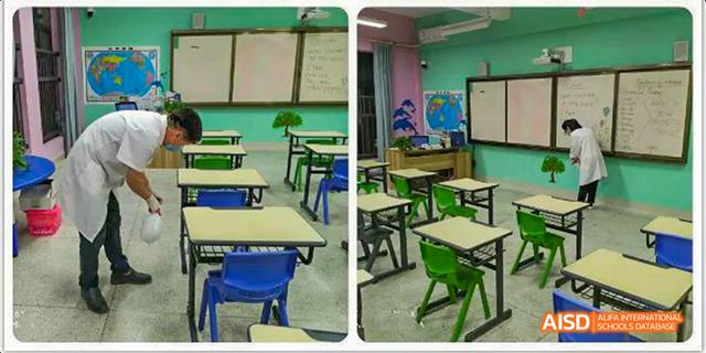Fuzhou Concord College of Sino-Canada - An empty classroom with blue and green chairs and desks arranged in rows.