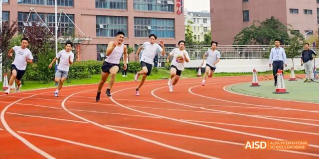 Hefei Thomas School students competing in a track and field race.