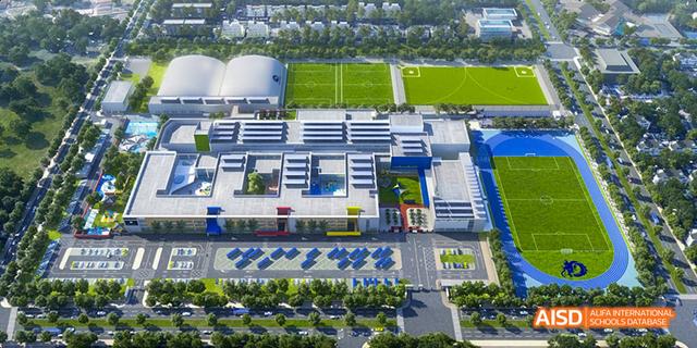 An aerial view of the campus and sports fields at the International School of Beijing.
