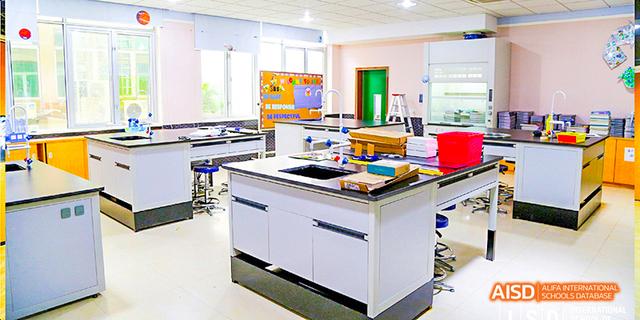 Interior view of a well-equipped science laboratory or specialized classroom at the International School of Dongguan.