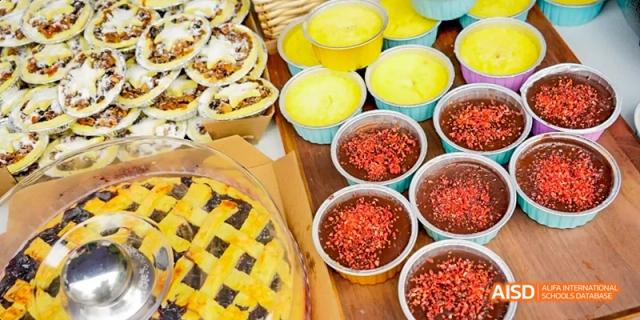 A variety of baked goods and desserts on a table, Léman International School Chengdu
