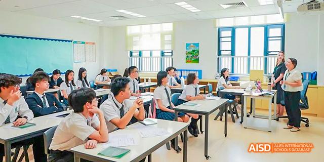A classroom full of students are sitting at desks, engaged in a lesson at Malvern College Chengdu.