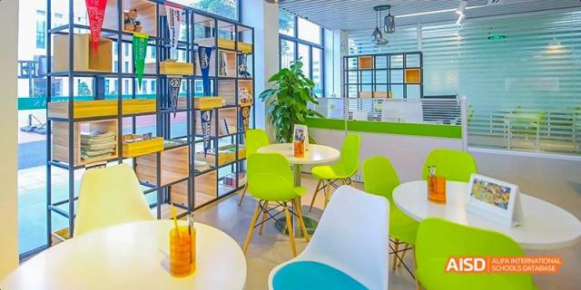 A modern, brightly lit reading corner in a school at Maple Leaf International School - Luoyang.