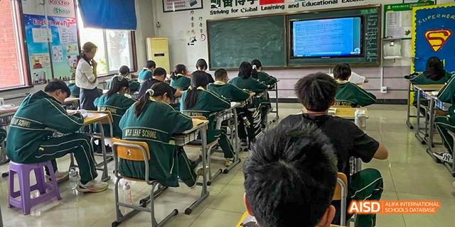 A view of students from the back of a classroom at Maple Leaf International School - Luoyang.