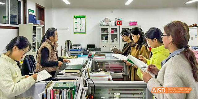 Students in a science lab with lab equipment at Maple Leaf International School - Luoyang.