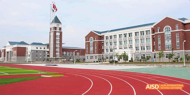 A running track and school building at Maple Leaf International School - Luoyang.