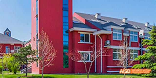 A close-up view of a red building at Beijing Aidi School