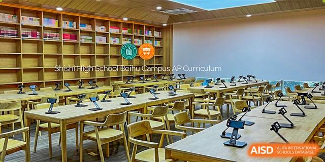 A classroom at Chengdu Shishi High School Beihu Campus AP Curriculum with empty desks and chairs.