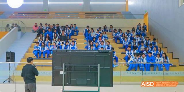 Chengdu Shishi High School Beihu Campus AP Curriculum students sit at desks, attentive to the front of a classroom.