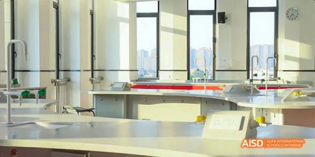 A bright study hall or library at Lady Eleanor Holles International School Foshan (LEH Foshan), with large windows overlooking the city.