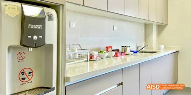 A clean kitchen or food preparation area at Lady Eleanor Holles International School Foshan (LEH Foshan) with white countertops.