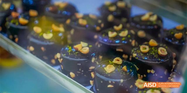 A closeup of what appears to be a chocolate dessert, part of a meal or event at Lady Eleanor Holles International School Foshan (LEH Foshan).