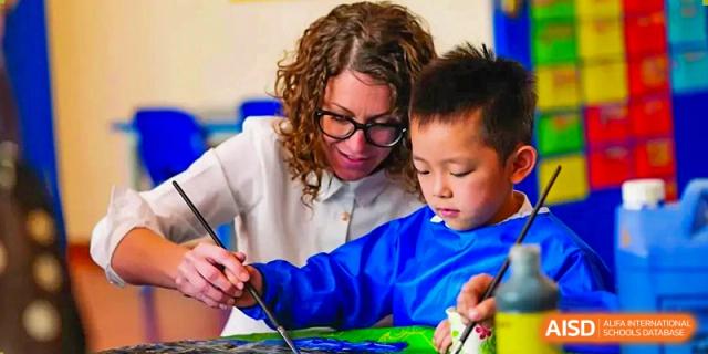 A teacher and student from Nord Anglia School Guangzhou Panyu focused on an art project.