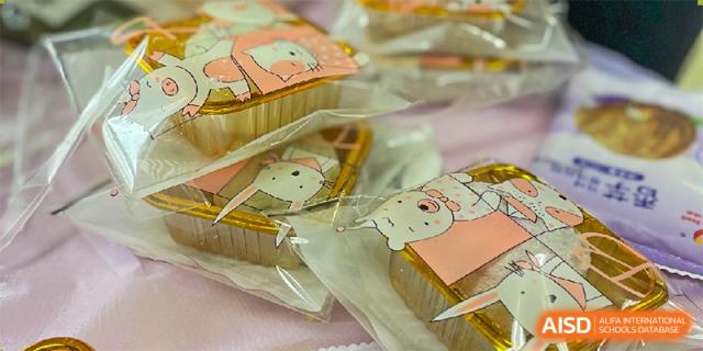 A close-up of individually packaged desserts or snacks featuring a cute bunny design at Orange County American High School Beijing Campus.