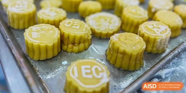 A close-up of finished mooncakes with embossed designs, ready to eat.