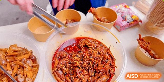 A close-up of a spicy meat dish served at Tianfu school The Integrated and Innovative Curriculum.