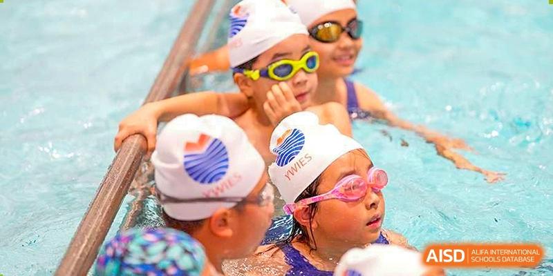 Yew Wah International Education School Of Beijing Yizhuang Campus students participating in a swimming activity.