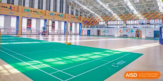 An empty badminton court inside the gymnasium at Nanjing Dongshan Foreign Language School International Department.