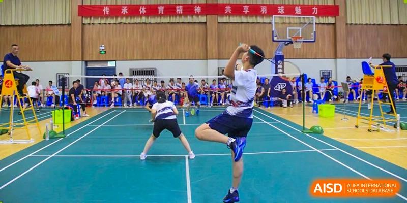 A student playing badminton during a match at Nanjing Dongshan Foreign Language School International Department.