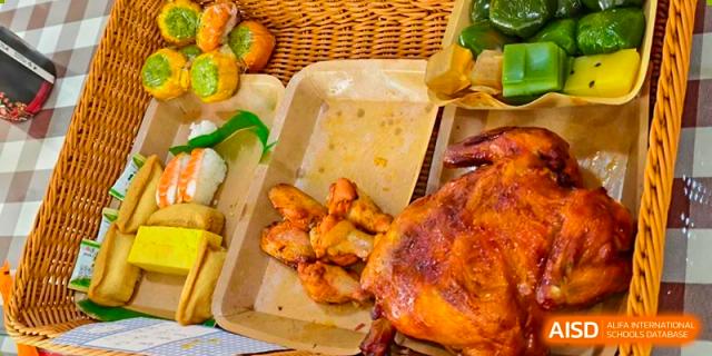 A close-up of a dish with roasted chicken from the cafeteria at Nanning No.2 High School International Division.