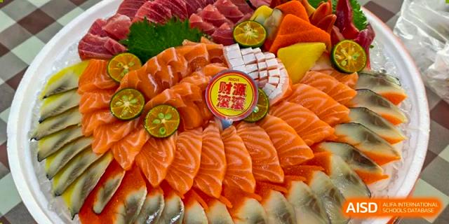 A platter of fresh salmon sashimi from the cafeteria at Nanning No.2 High School International Division.