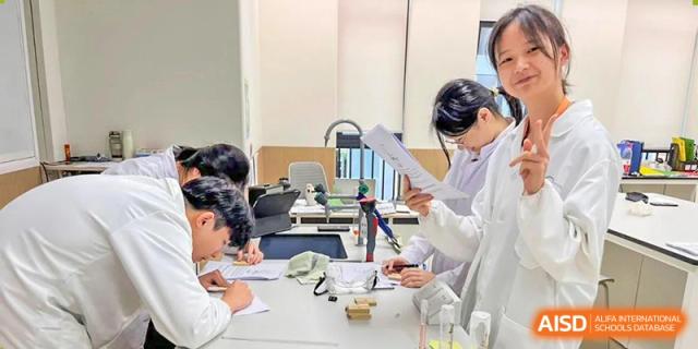 Students from BASIS International & Bilingual Schools Chengdu working on a hands-on project in a science lab.