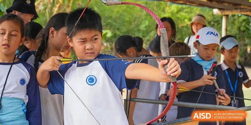 A student from BASIS International & Bilingual Schools Chengdu practicing archery.