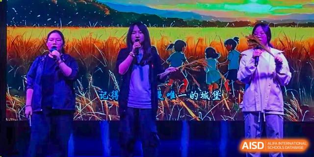 AcaBridge Academy student singing into a microphone on a stage with vibrant, colorful, and artistic lighting and a digital backdrop.