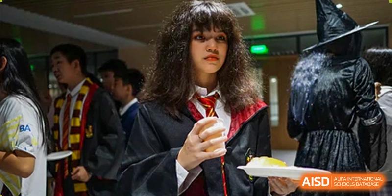 A Merchiston International School Shenzhen student dressed in a themed costume (like a wizard's robes) for a school spirit day or event.