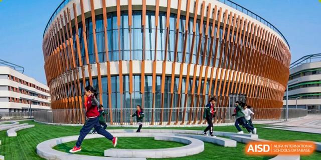 A modern building with a unique facade at Huzhou South Taihu Bilingual School.
