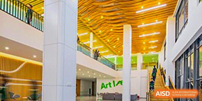 A bright, modern indoor space with the word "Art" on the wall at Huzhou South Taihu Bilingual School.