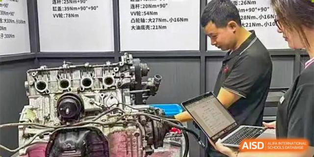 A close-up of a complex machine or engine in a vocational or engineering class at The First High School of Changsha, Hunan.