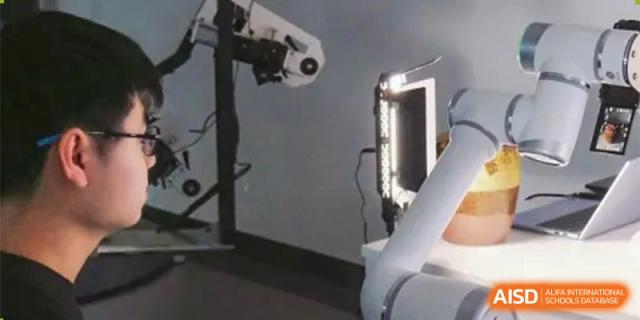 A detail shot of a piece of equipment, possibly a robot arm, in a technology lab at The First High School of Changsha, Hunan.