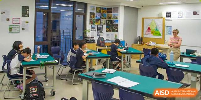 BASIS International School Nanjing students seated at desks in a classroom.